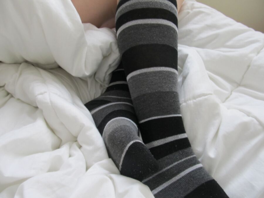 Cute Feet in Grey Striped Socks