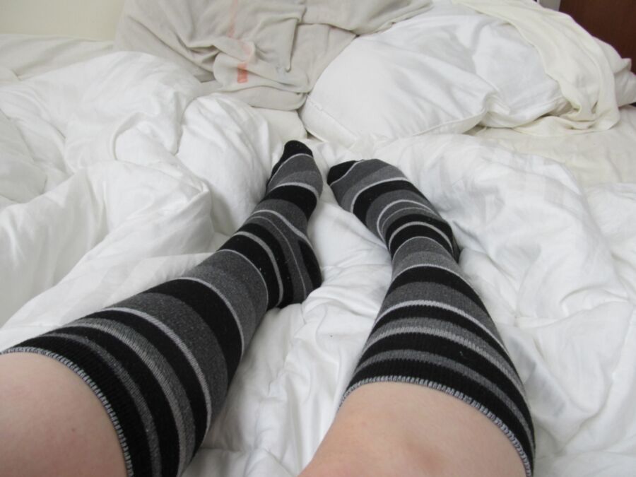 Cute Feet in Grey Striped Socks