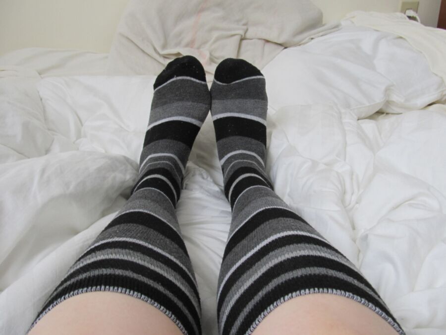 Cute Feet in Grey Striped Socks