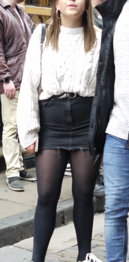 Teen in pantyhose and short denim skirt