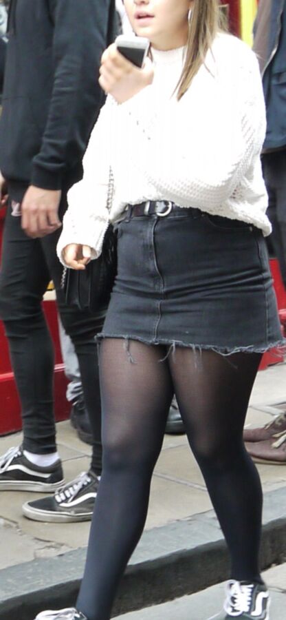 Teen in pantyhose and short denim skirt