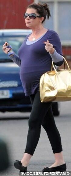 Smoking pregnant dressed