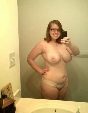 Women in glasses taking self shots