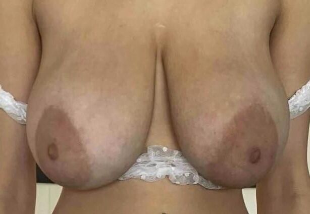 One lady, beautiful huge tits and thin body.