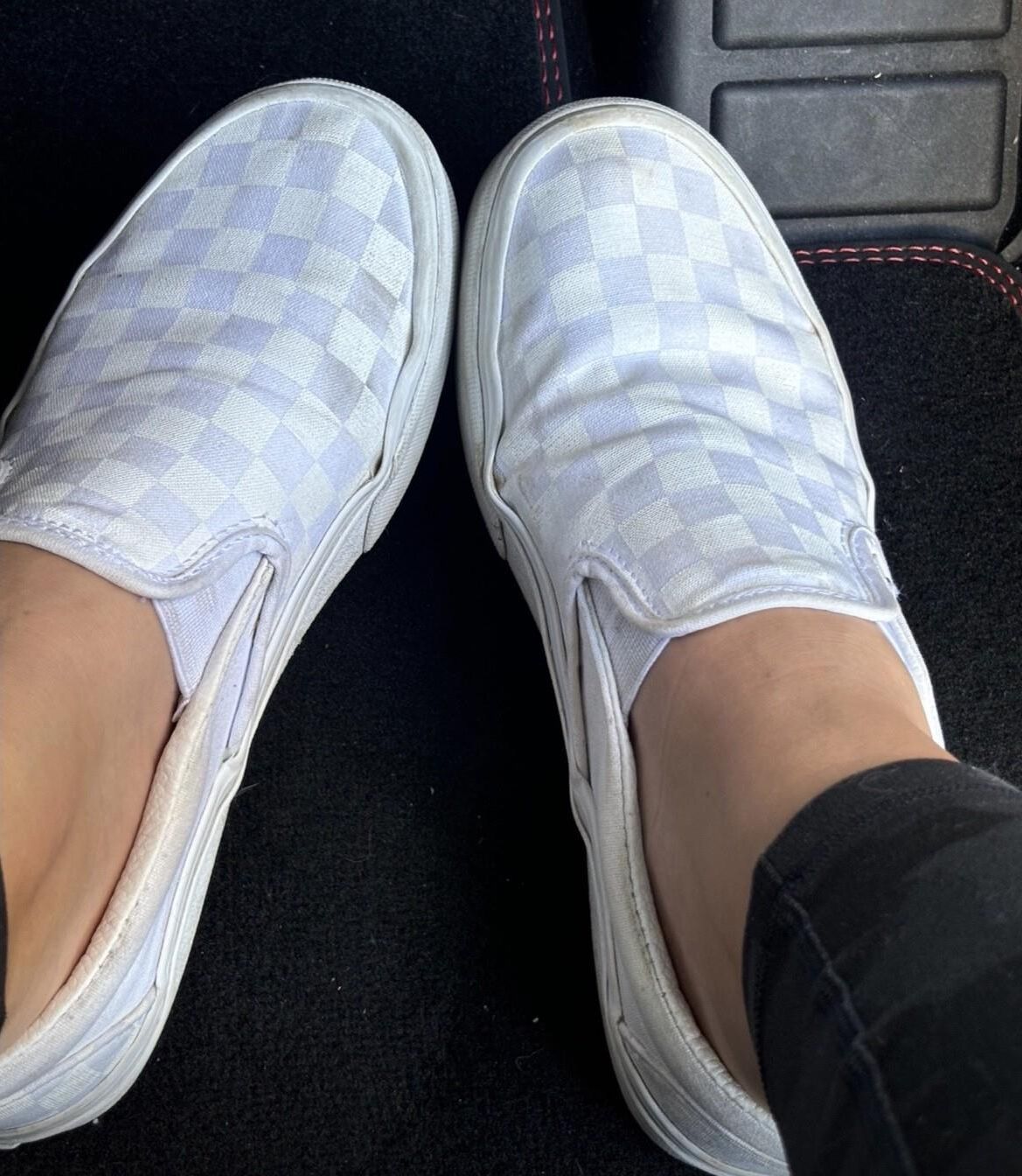 Ash removes her sweaty Vans in the car to show her toes