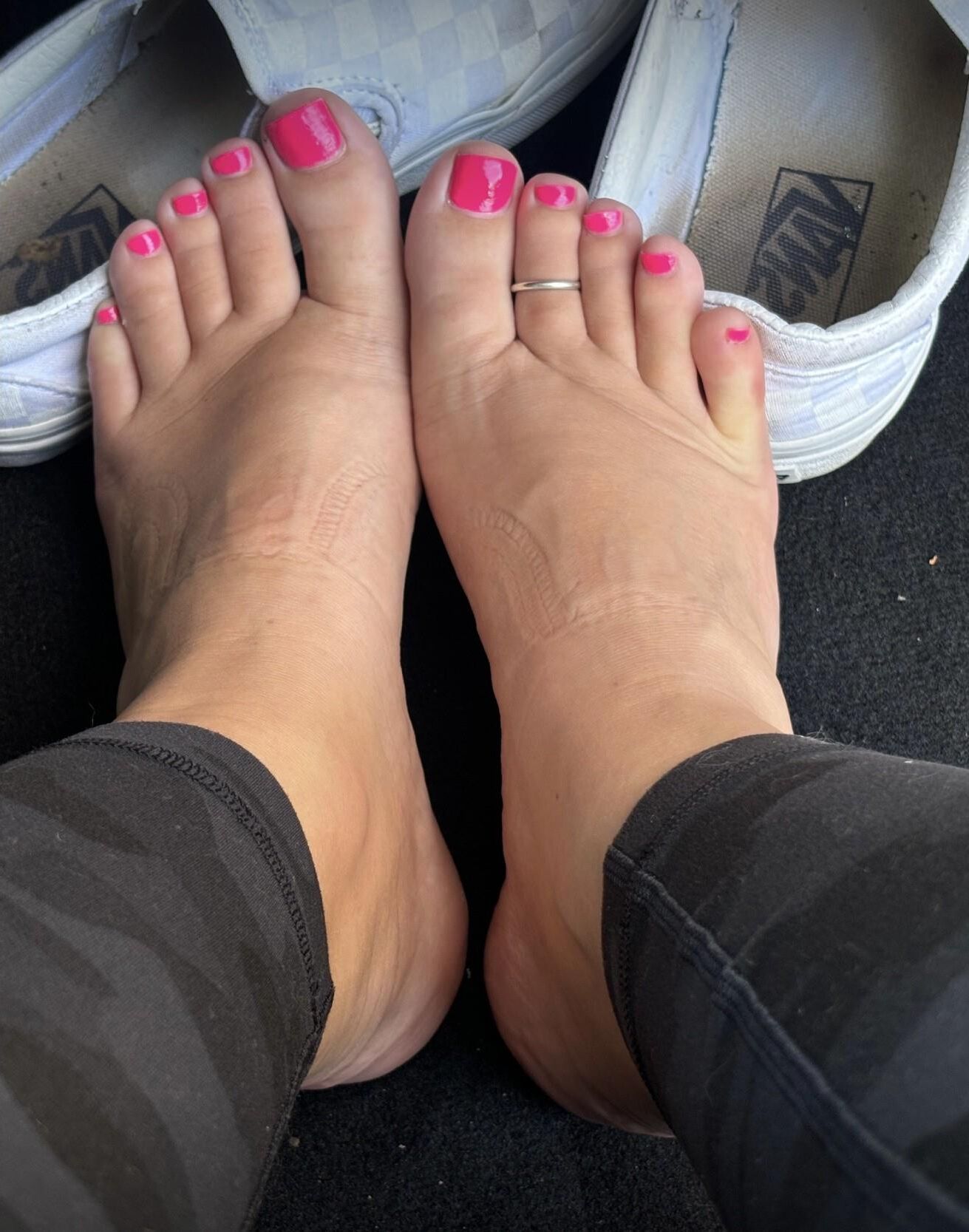 Ash removes her sweaty Vans in the car to show her toes