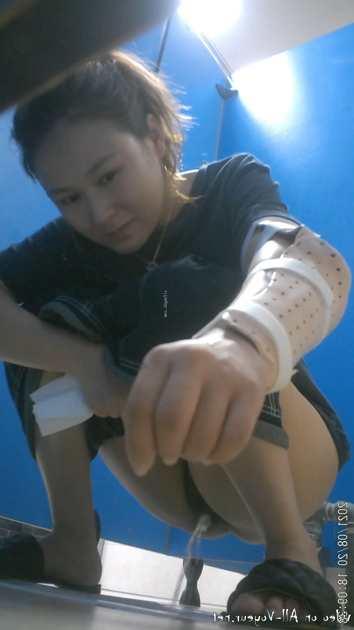 Bathroom Shot Panoramic front shot of a young lady pee 