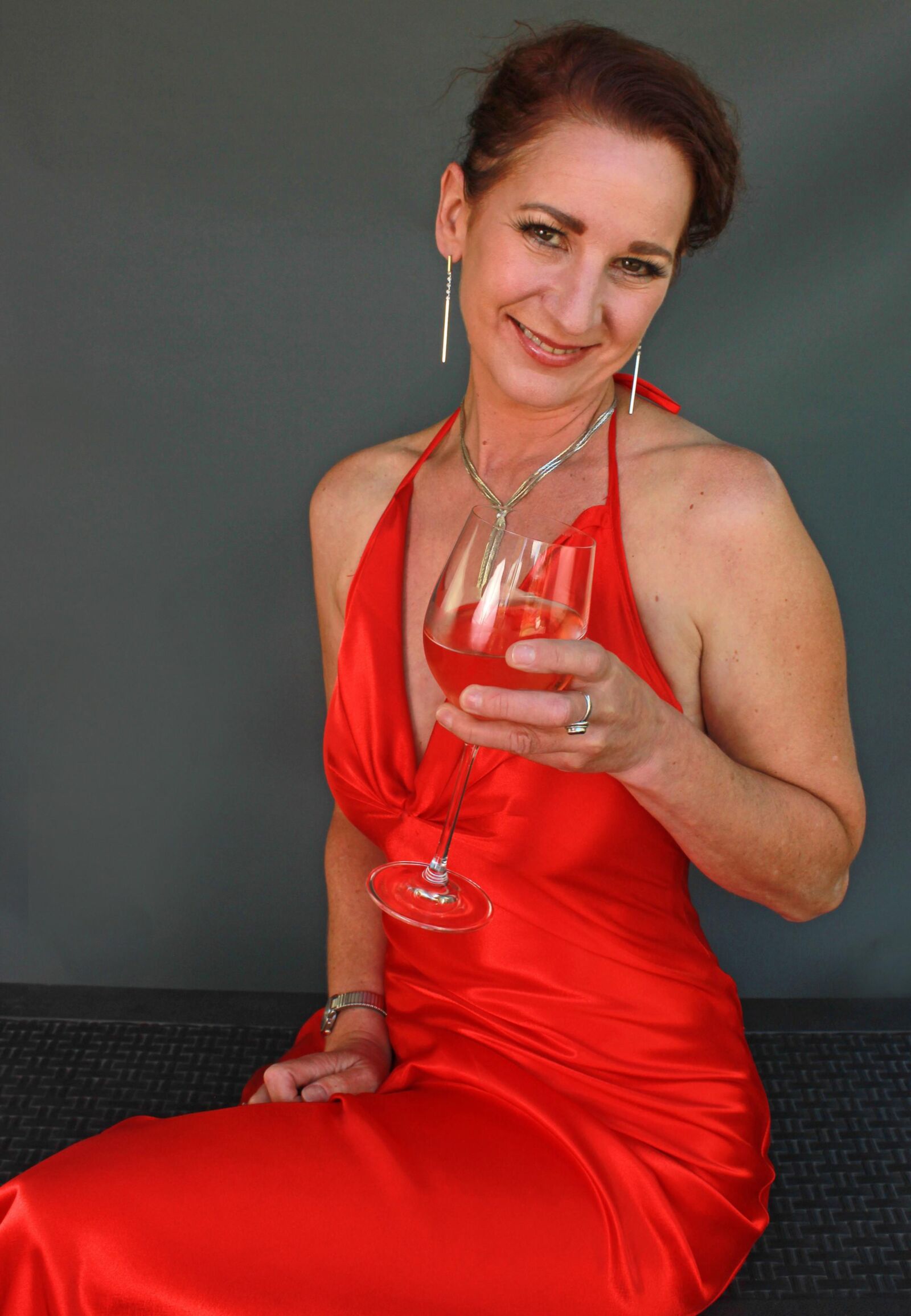 Mature fuckpig wining and reclining in red satin (NN)