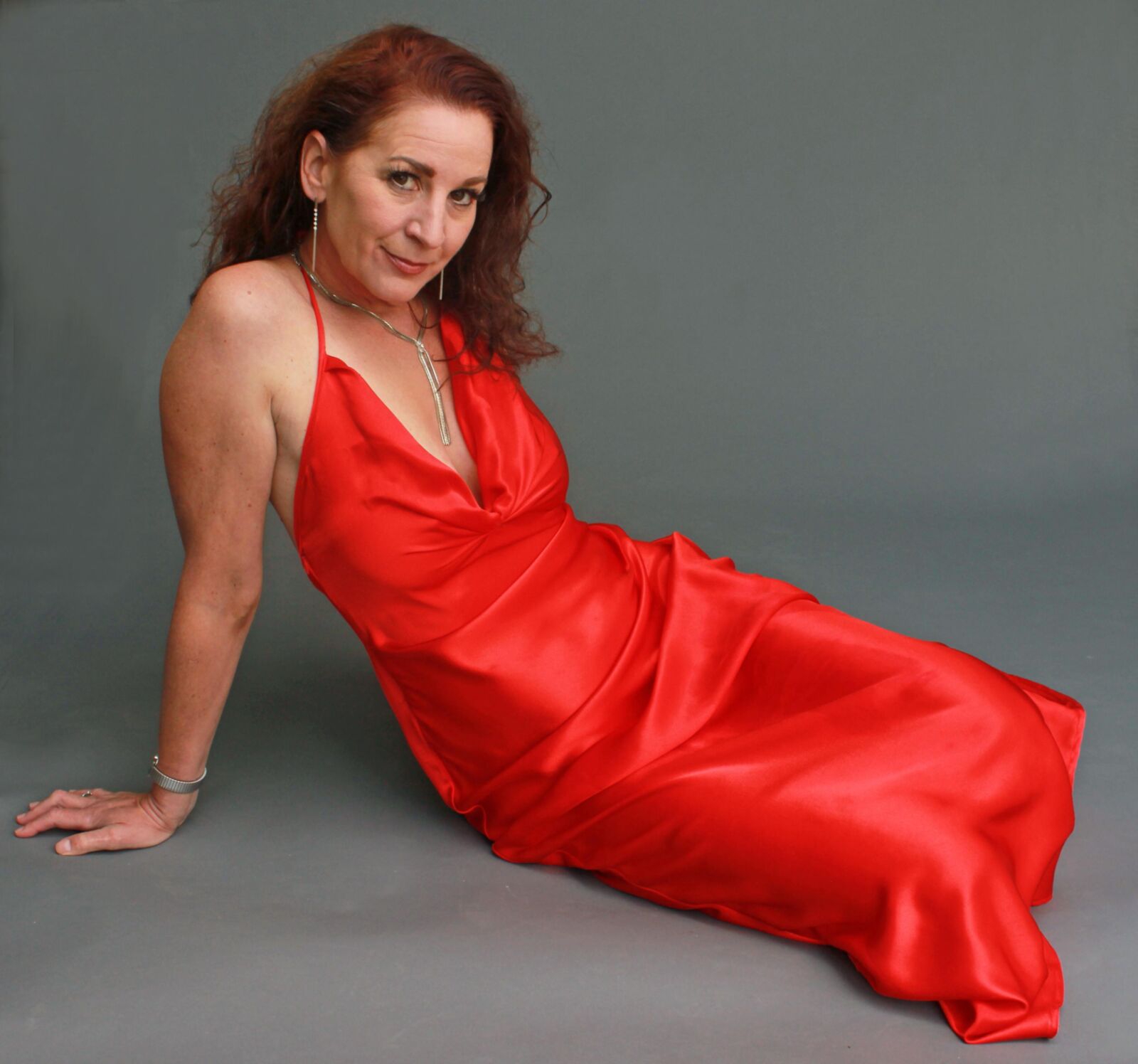 Mature fuckpig wining and reclining in red satin (NN)