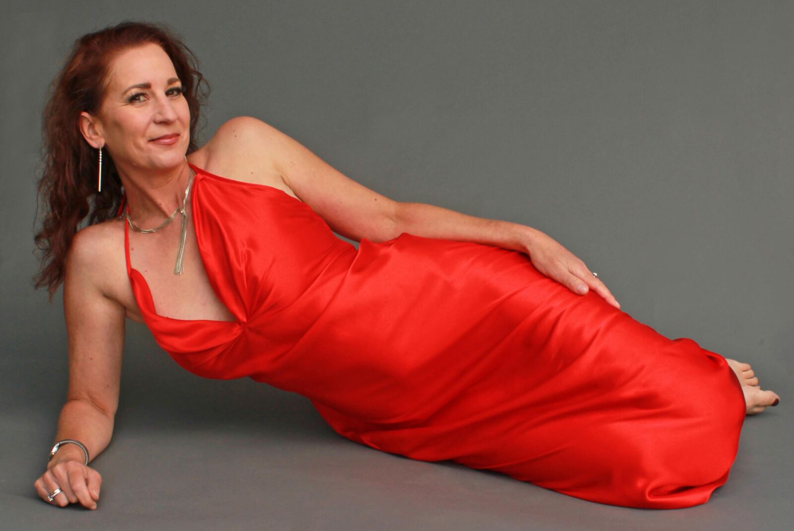 Mature fuckpig wining and reclining in red satin (NN)