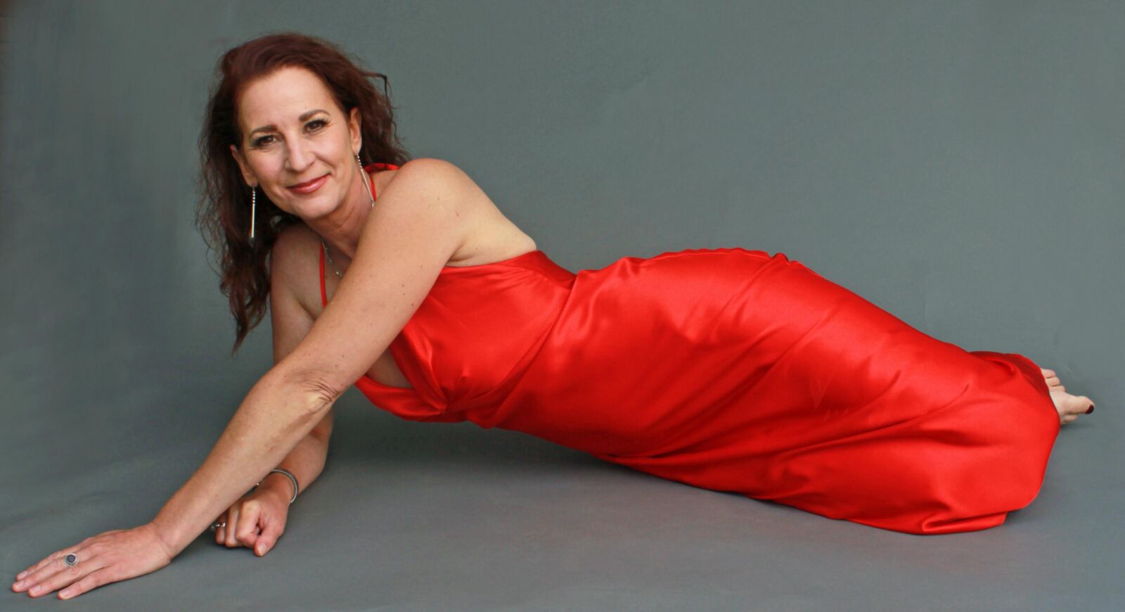 Mature fuckpig wining and reclining in red satin (NN)