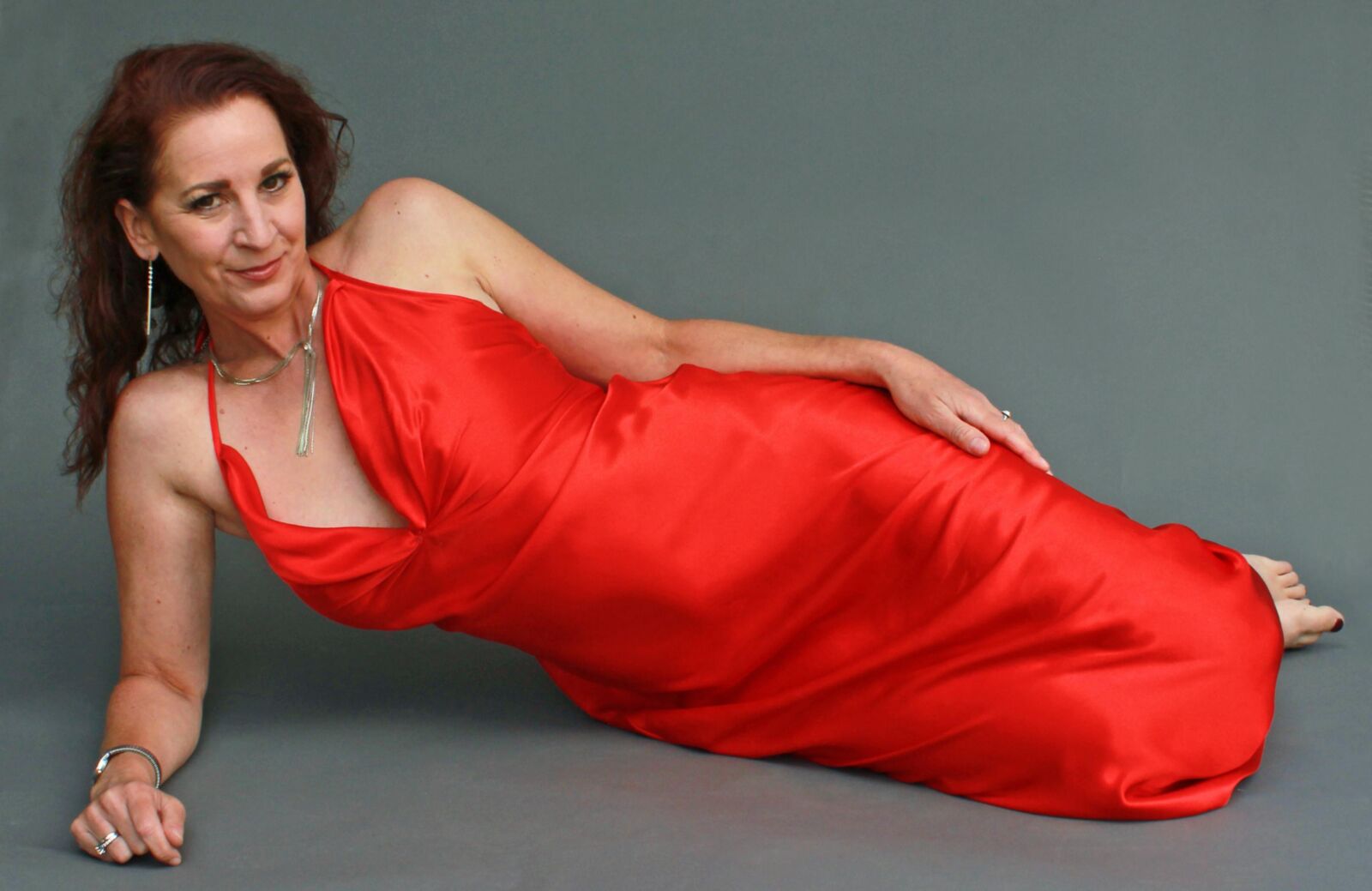 Mature fuckpig wining and reclining in red satin (NN)