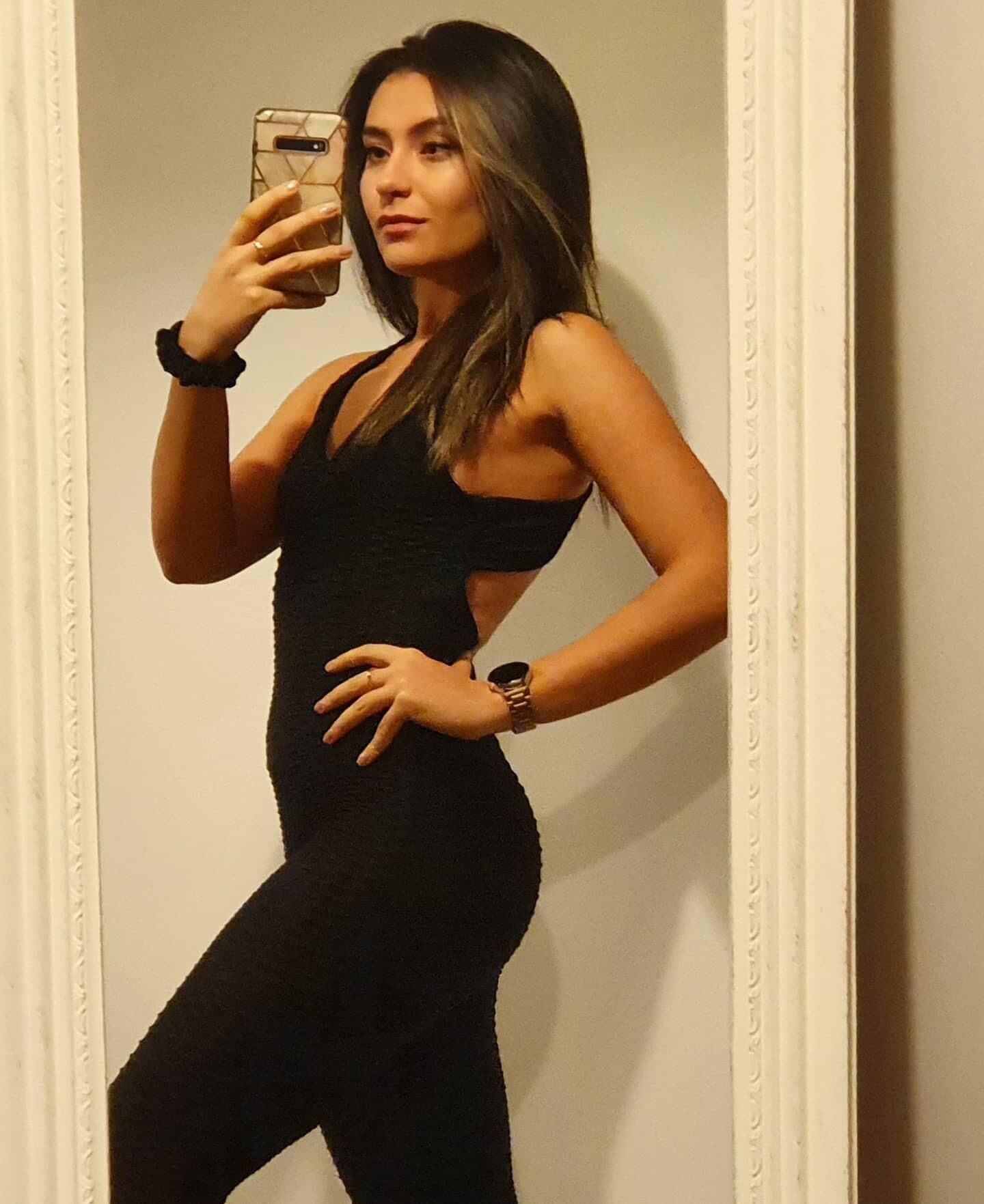 Black sleeveless tops and metal wristwatches #