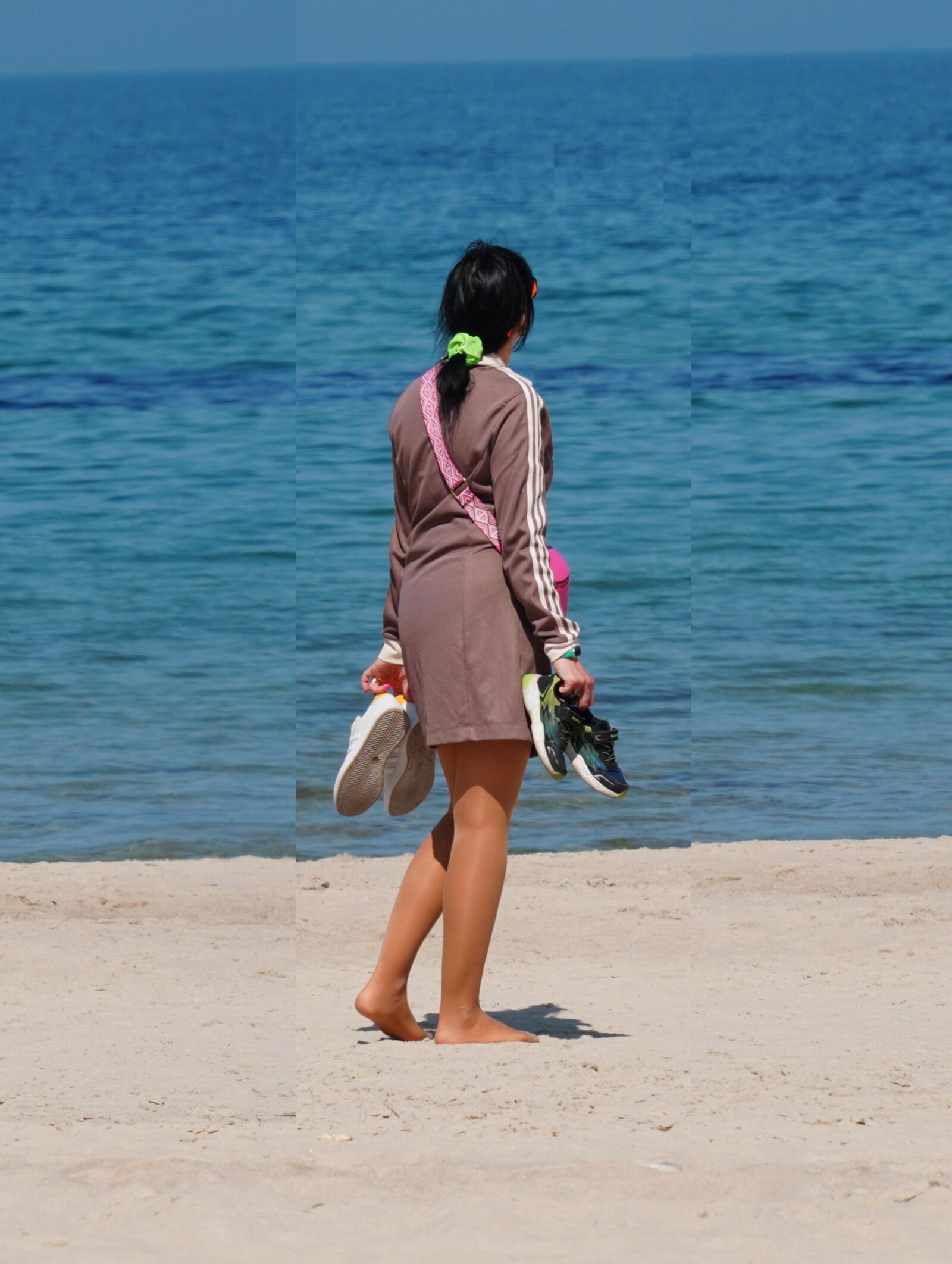sexy wife in pantyhose on the beach