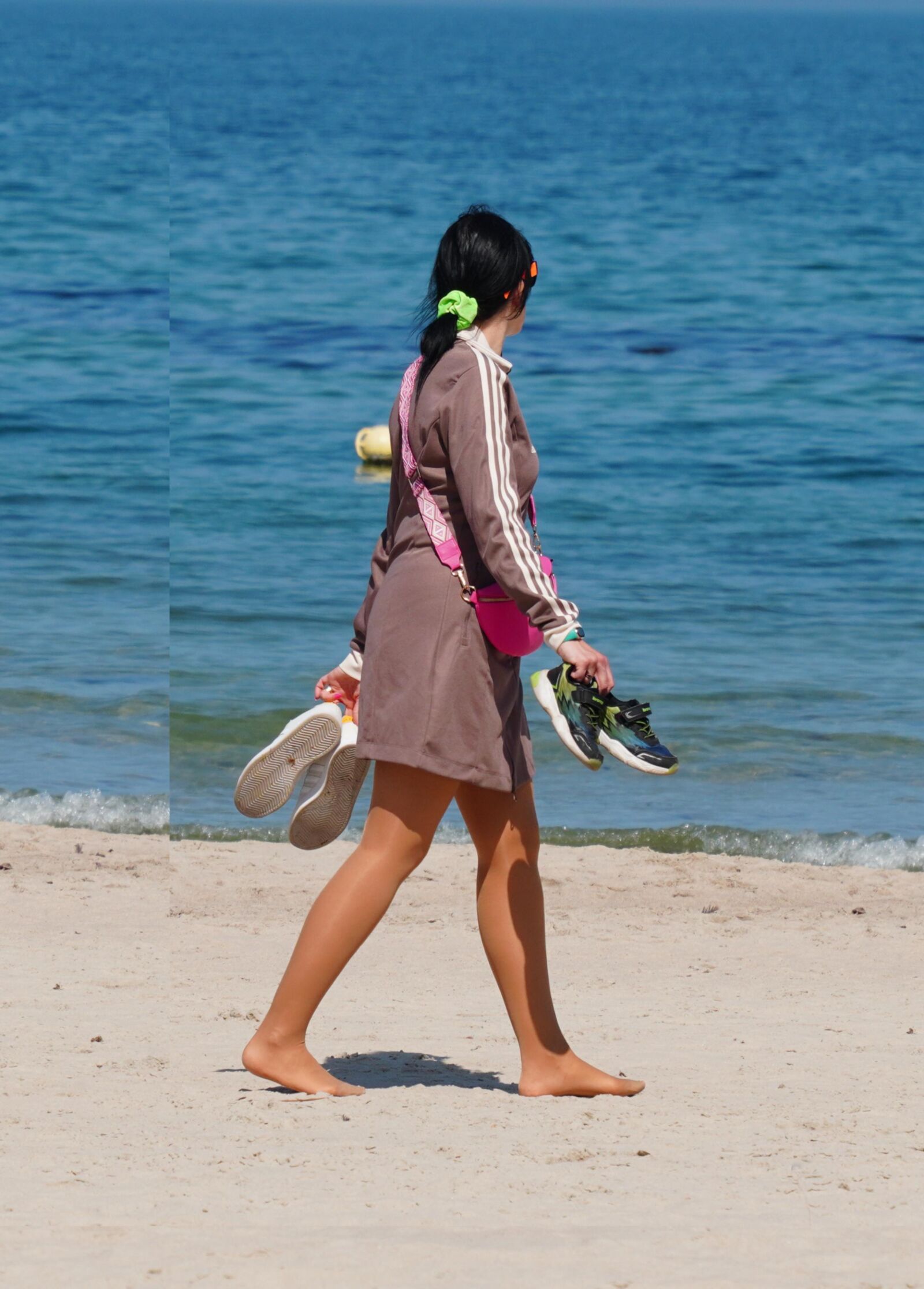 sexy wife in pantyhose on the beach