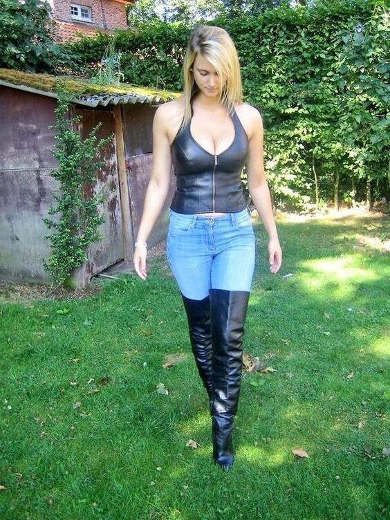 Busty Blonde in Boots and Jeans