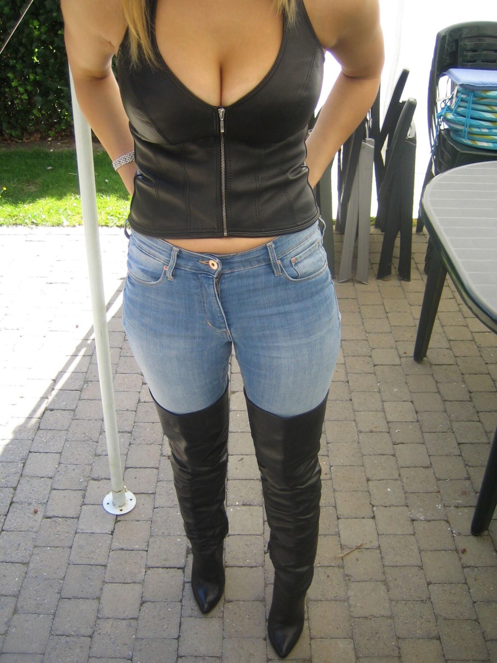 Busty Blonde in Boots and Jeans