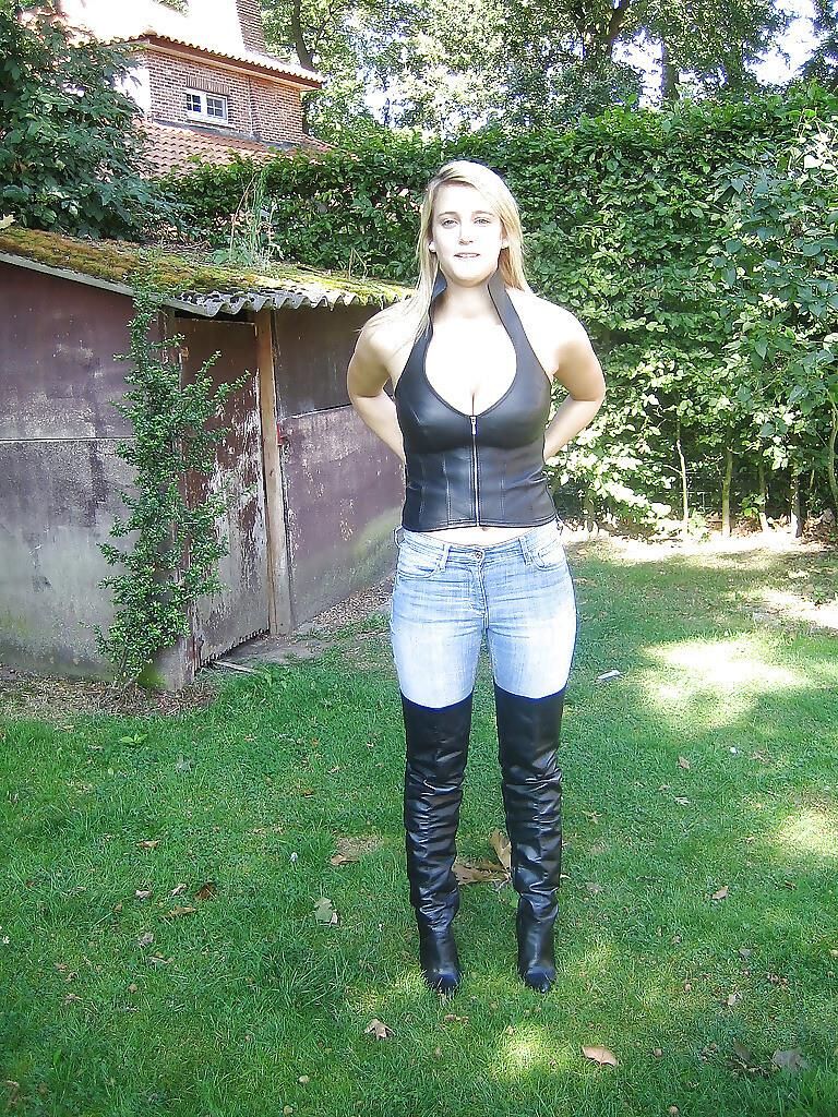 Busty Blonde in Boots and Jeans