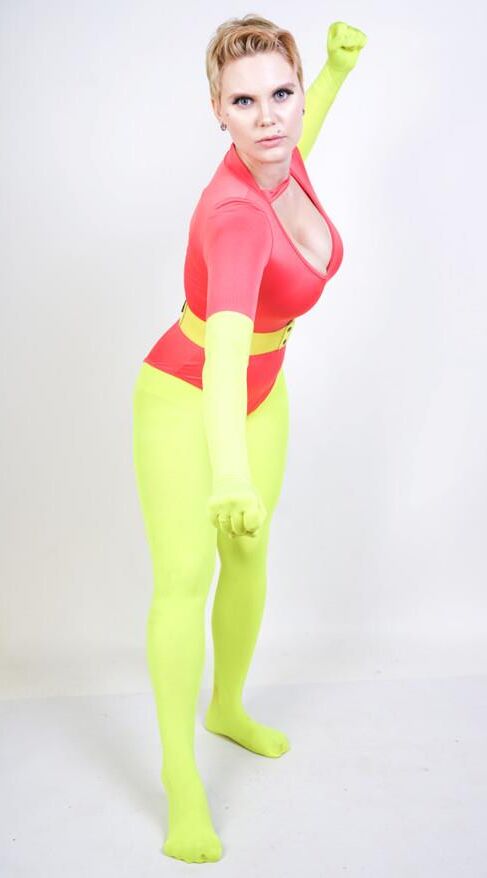 Non nude stock image short hair yellow red leotard super hero fe