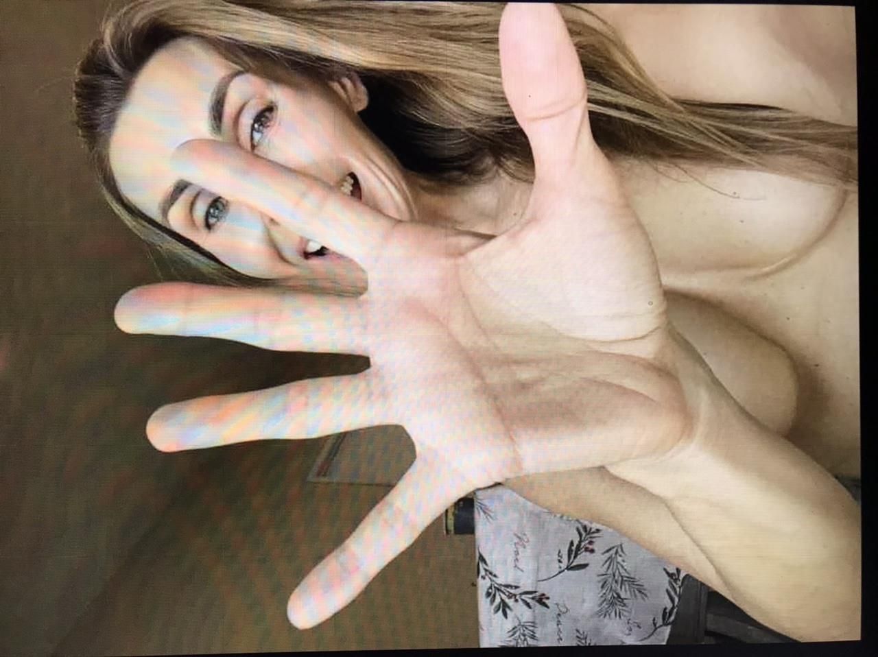 Tanya Tate palm hands