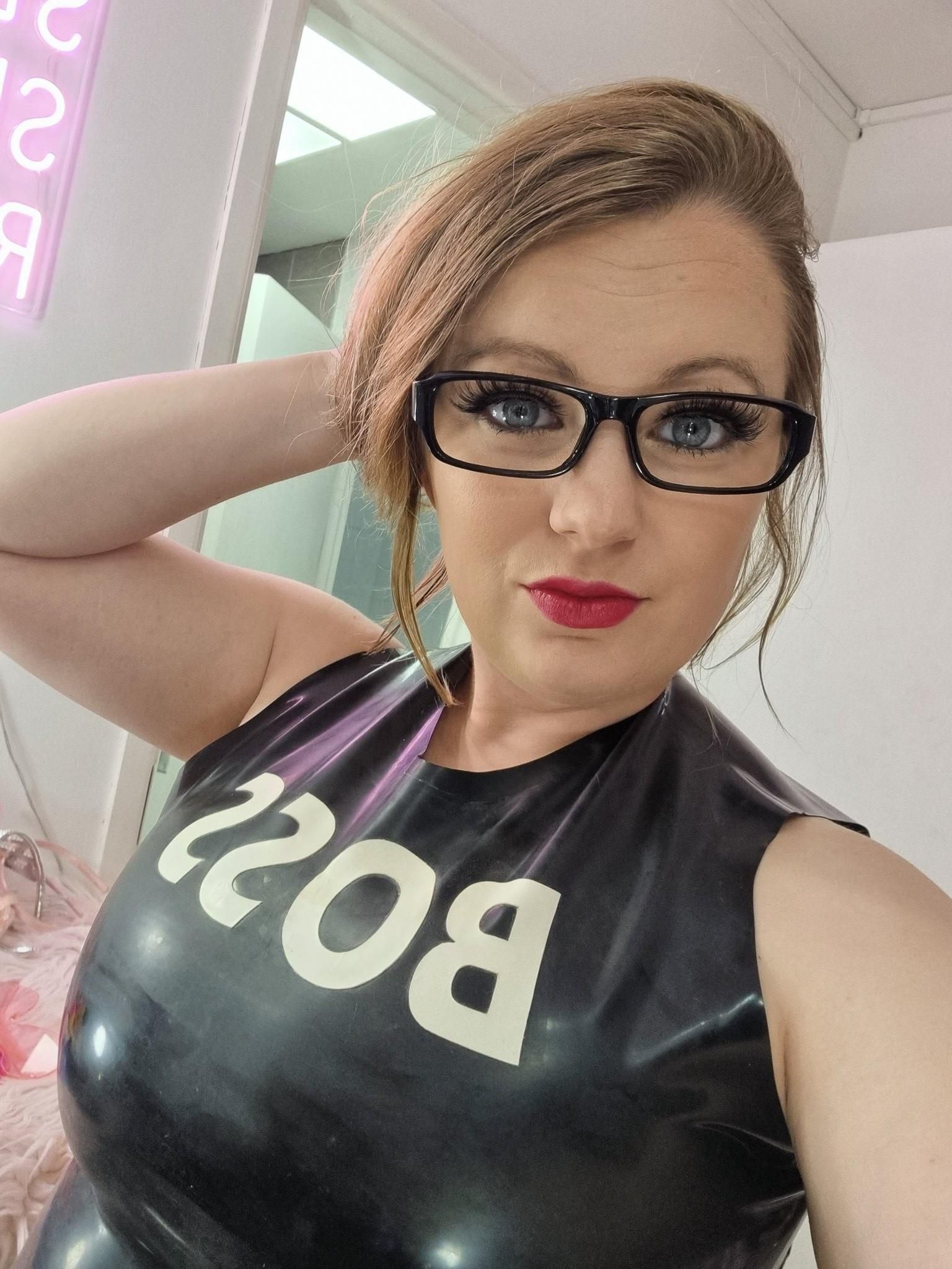 Mistress Ashley and her big tits in leather and rubber