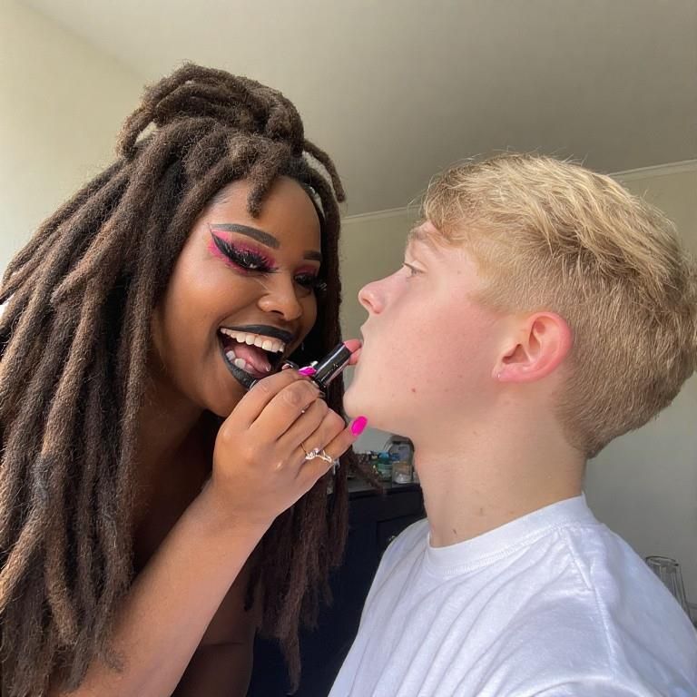 Black women feminizing white boys with lipstick