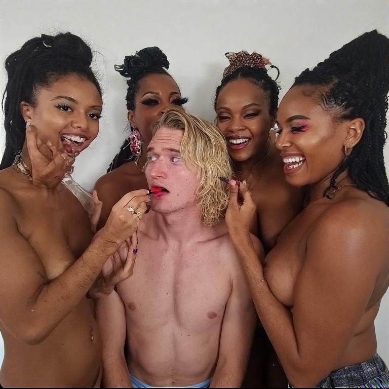 Black women feminizing white boys with lipstick