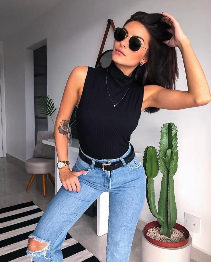 Black sleeveless tops and metal wristwatches #