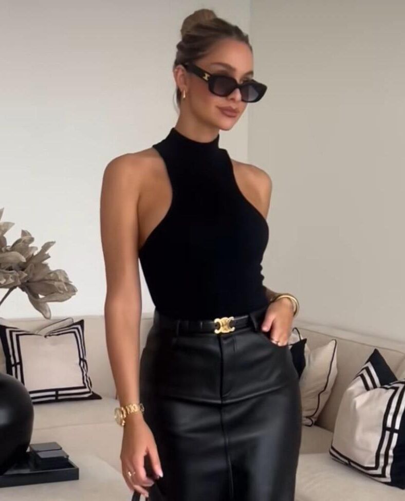 Black sleeveless tops and metal wristwatches #