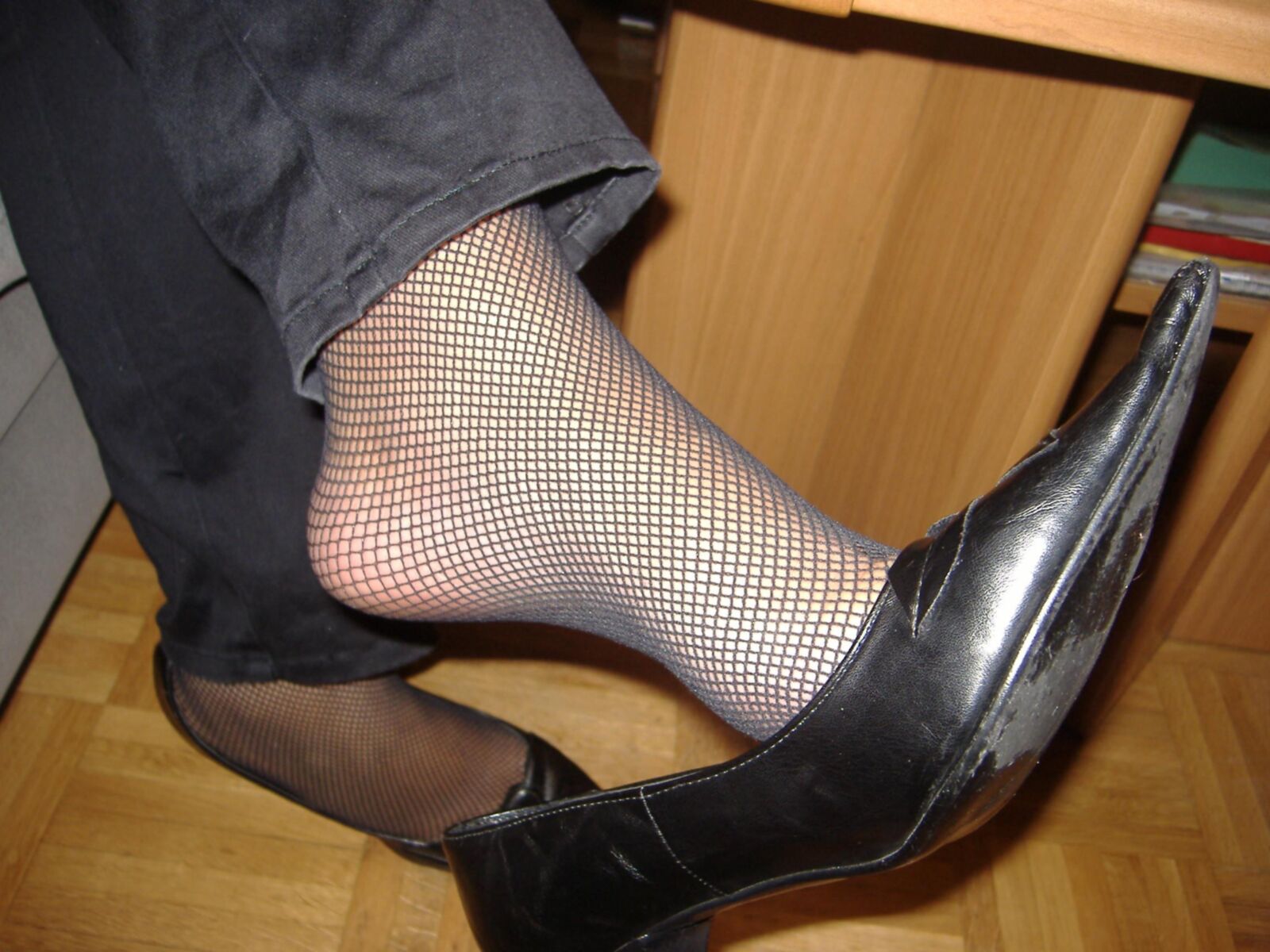 feet close ups in fishnets and shoes 
