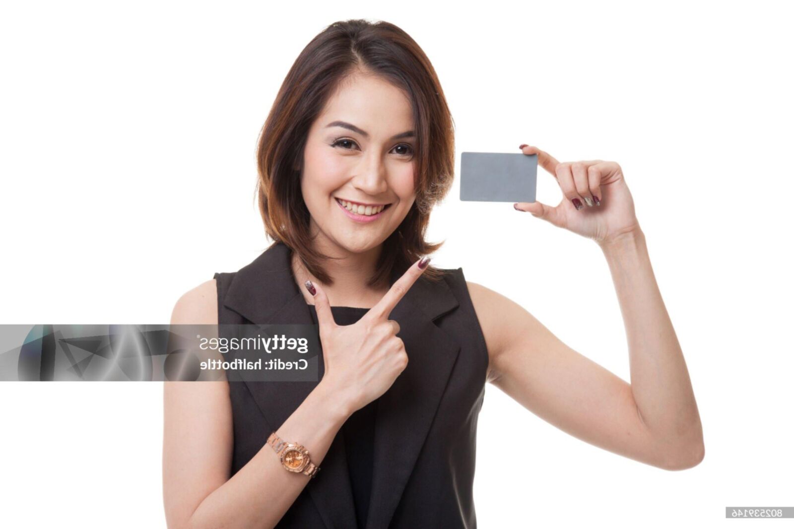 Black sleeveless tops and metal wristwatches #