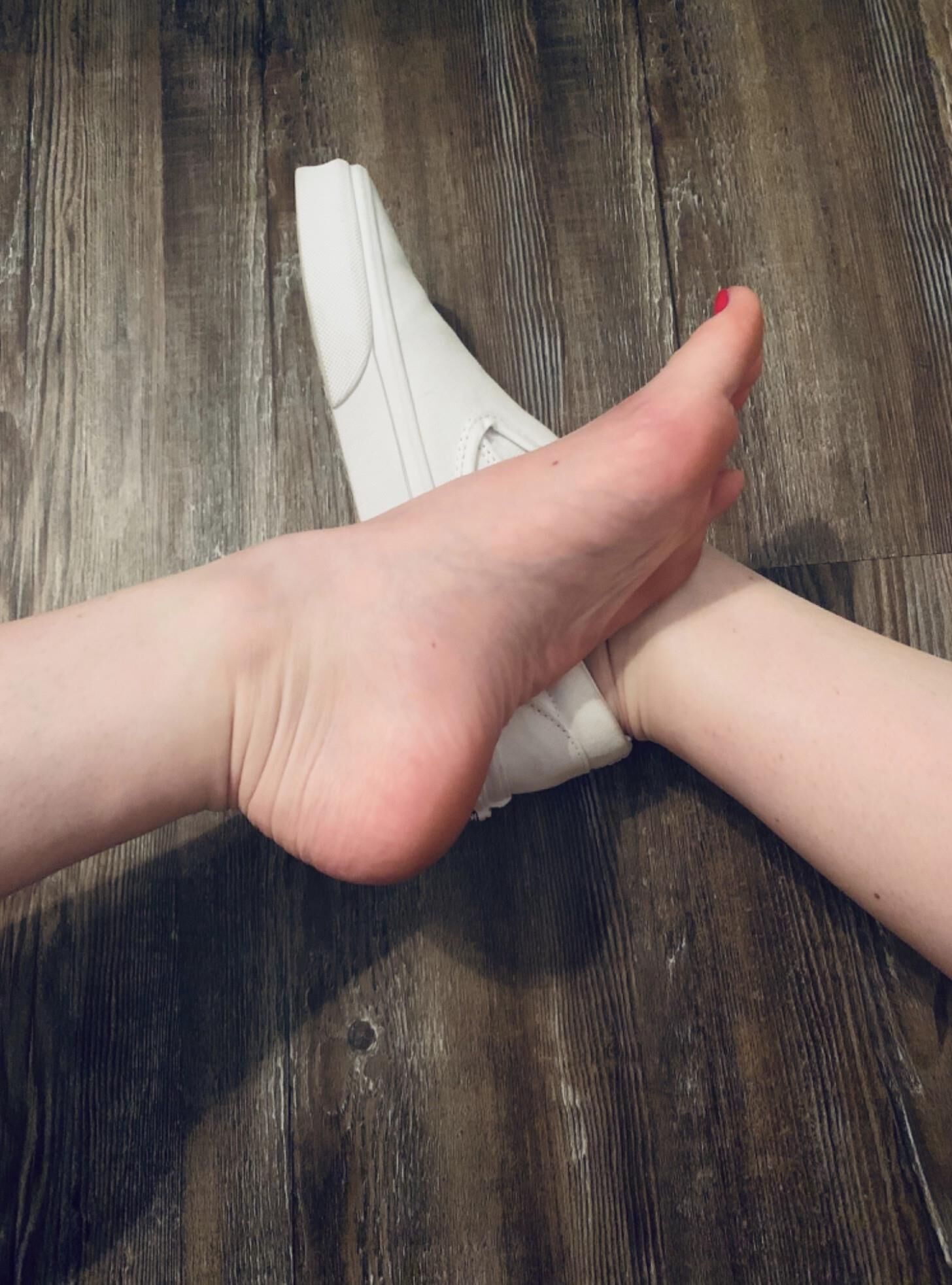 Heather removing her shoes showing her beautiful toes