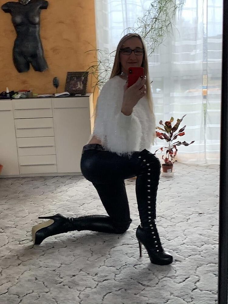 Helene wears her slutty boots