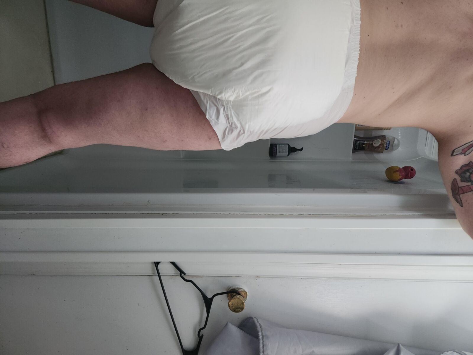 Diapered loser leaks all over