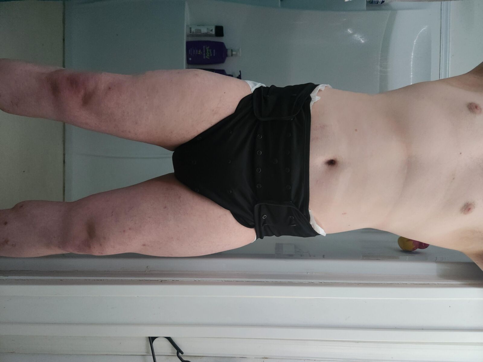 Diapered loser leaks all over