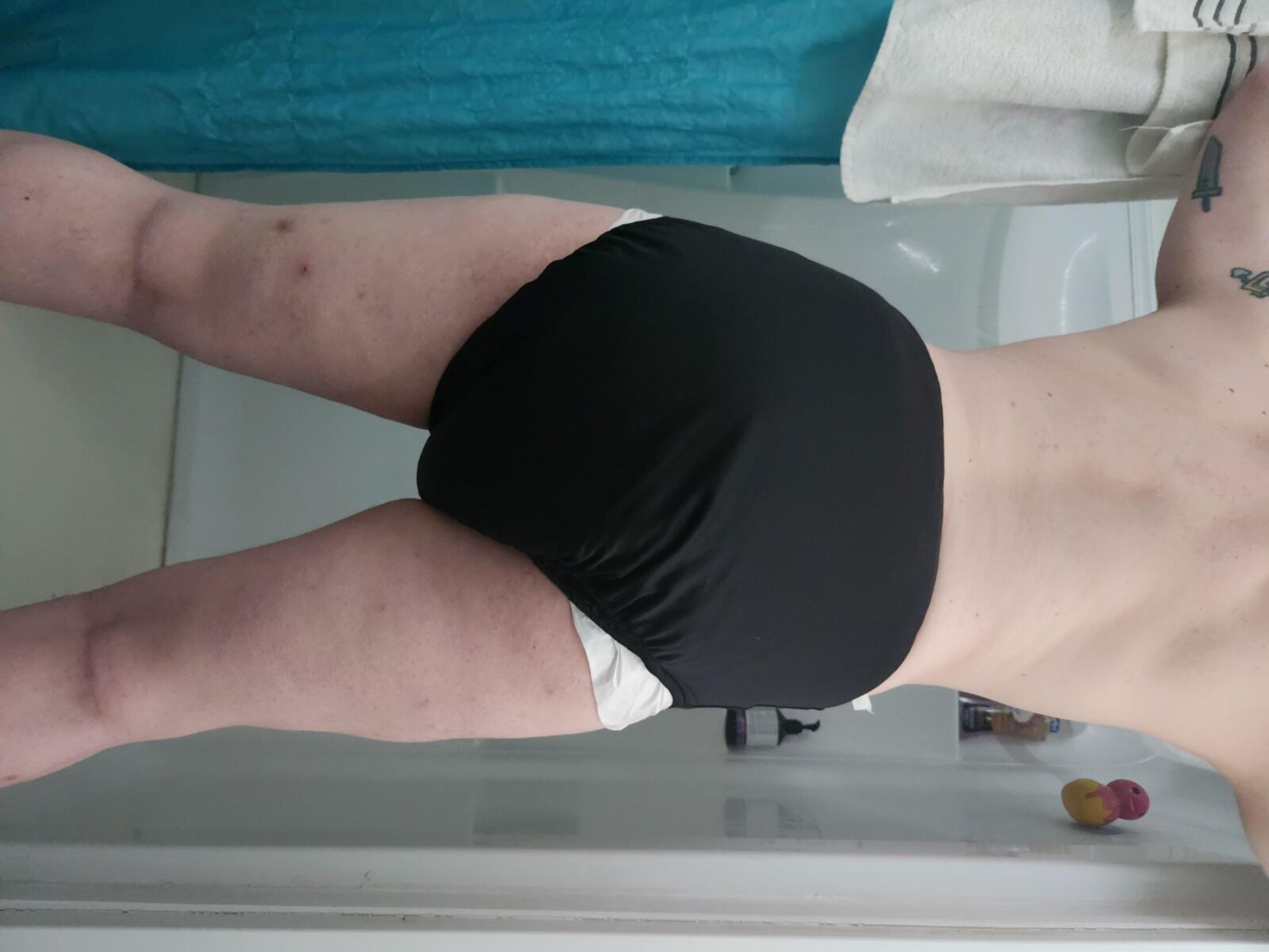 Diapered loser leaks all over