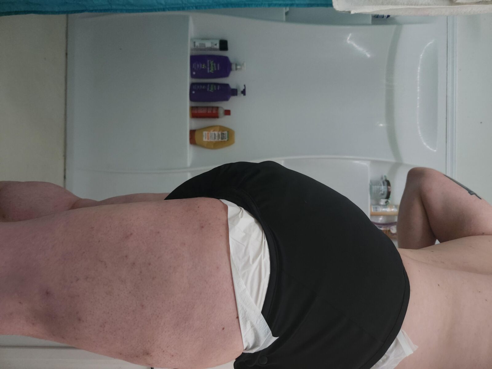 Diapered loser leaks all over