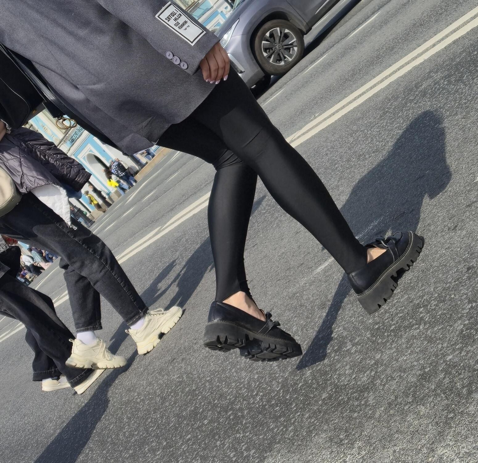 Girl in jacket and black leggins