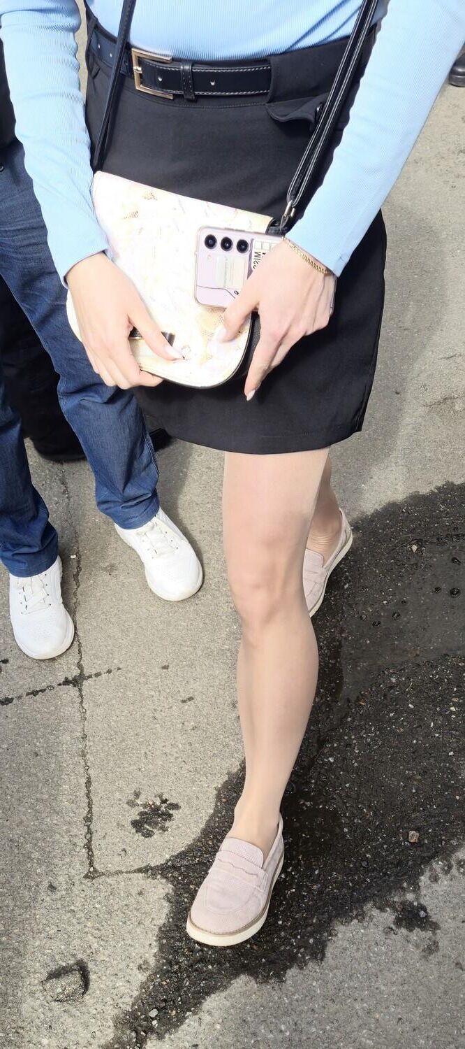 Woman in shiny pantyhose