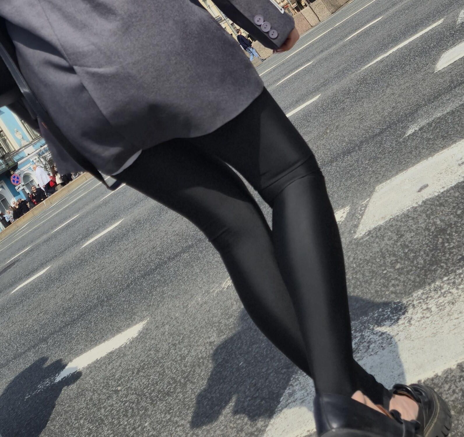 Girl in jacket and black leggins