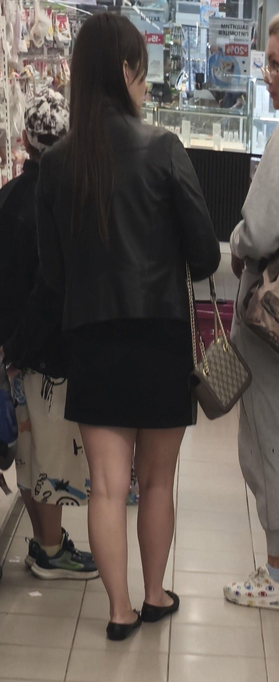 Girl in mini skirt and ballerinas shoes