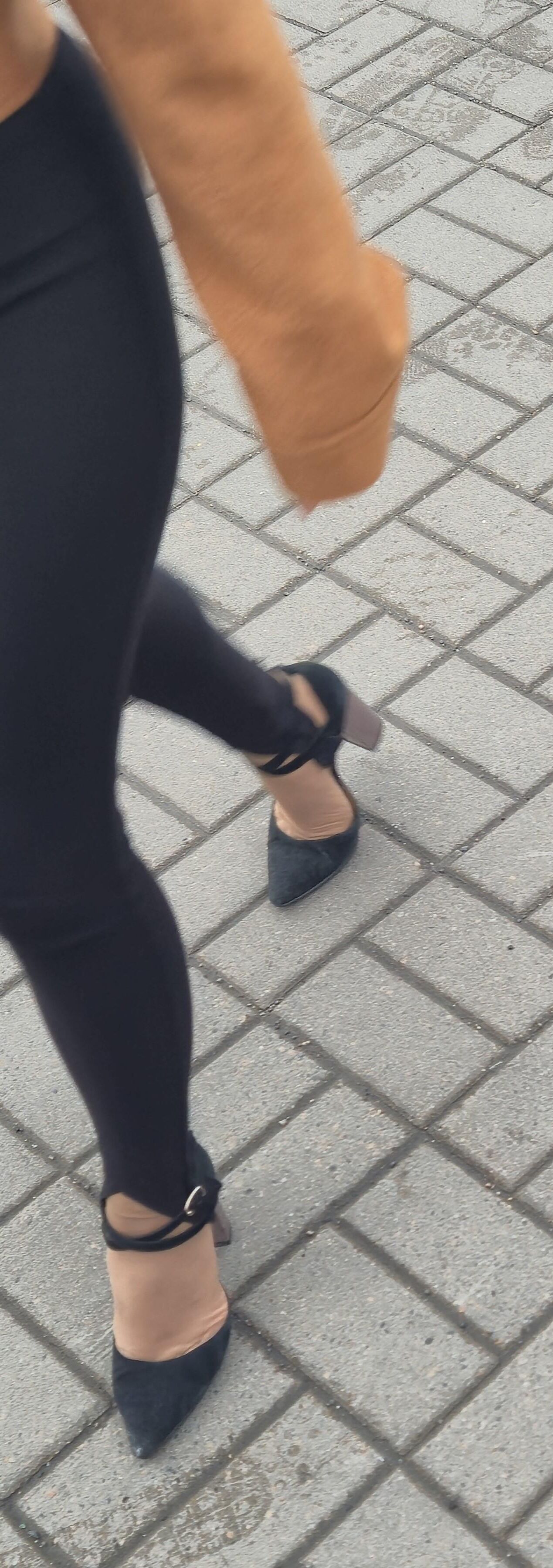 Woman in leggins and suede heels