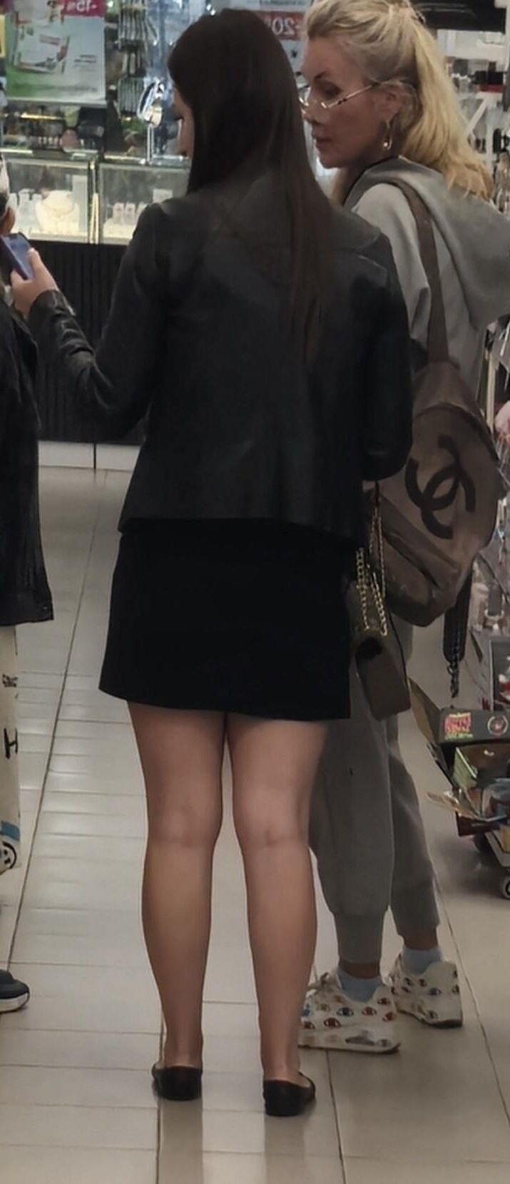 Girl in mini skirt and ballerinas shoes