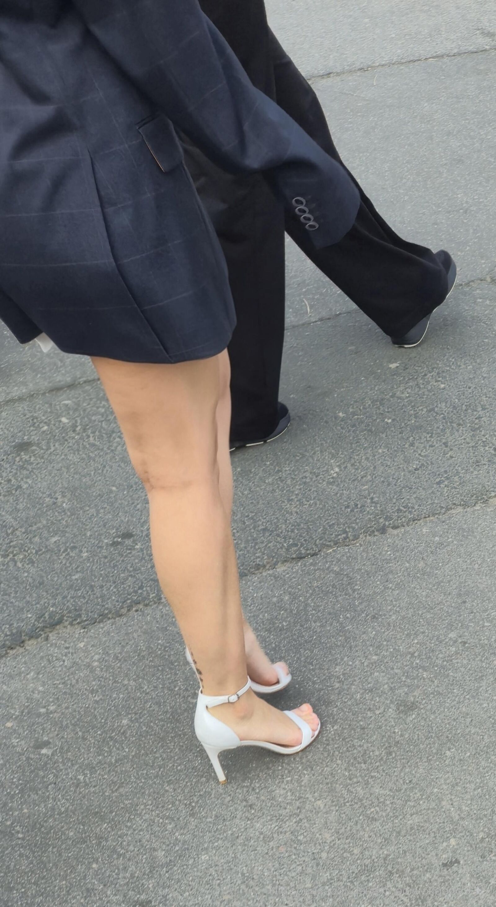 Girl in white sandal heels