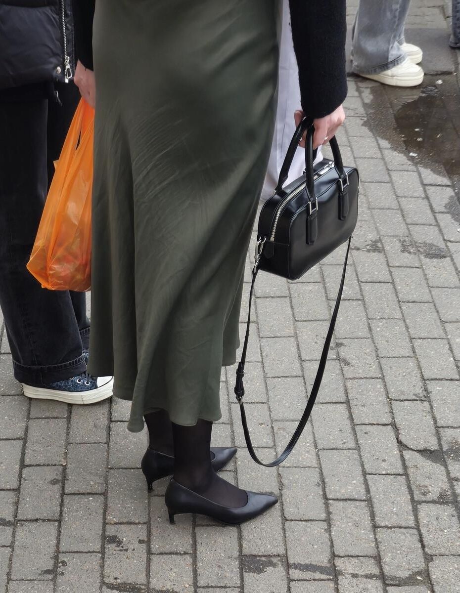 Woman in long skirt and heels