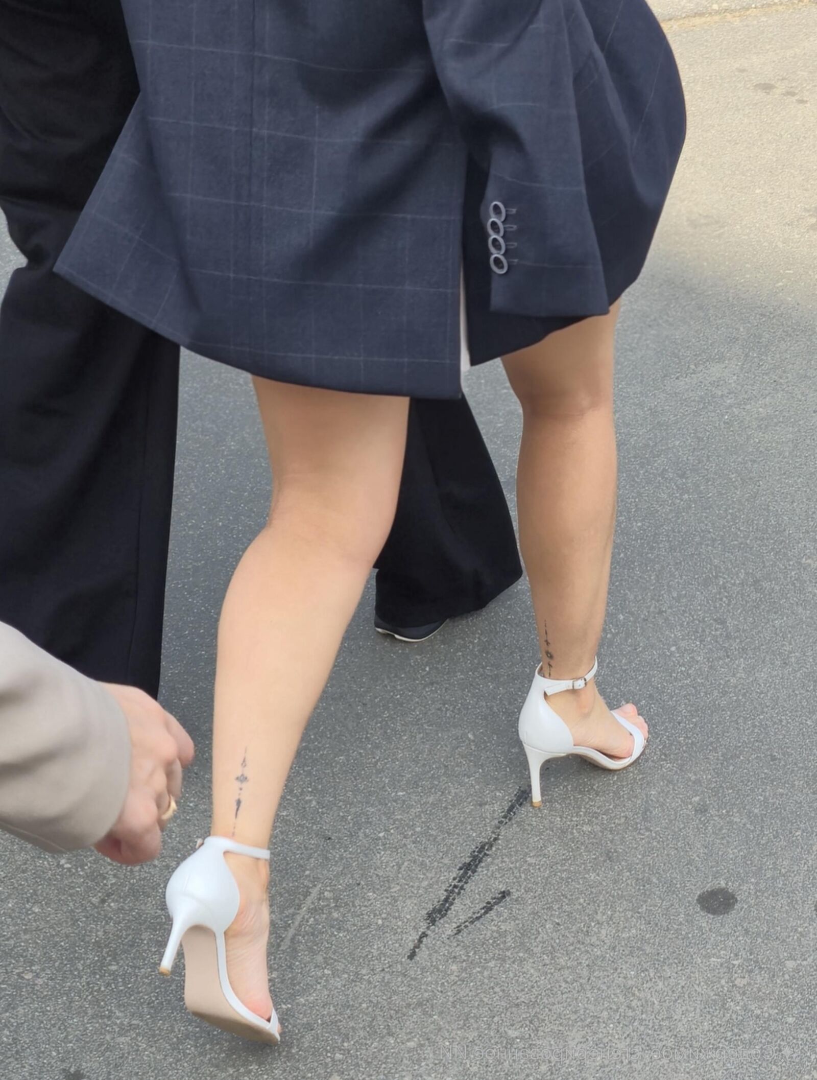 Girl in white sandal heels