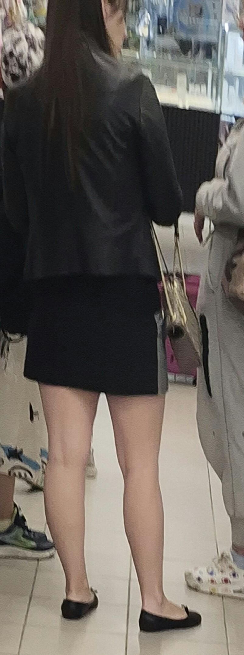 Girl in mini skirt and ballerinas shoes