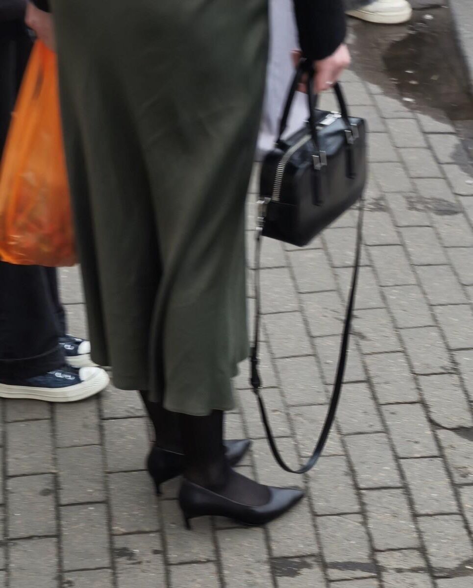 Woman in long skirt and heels