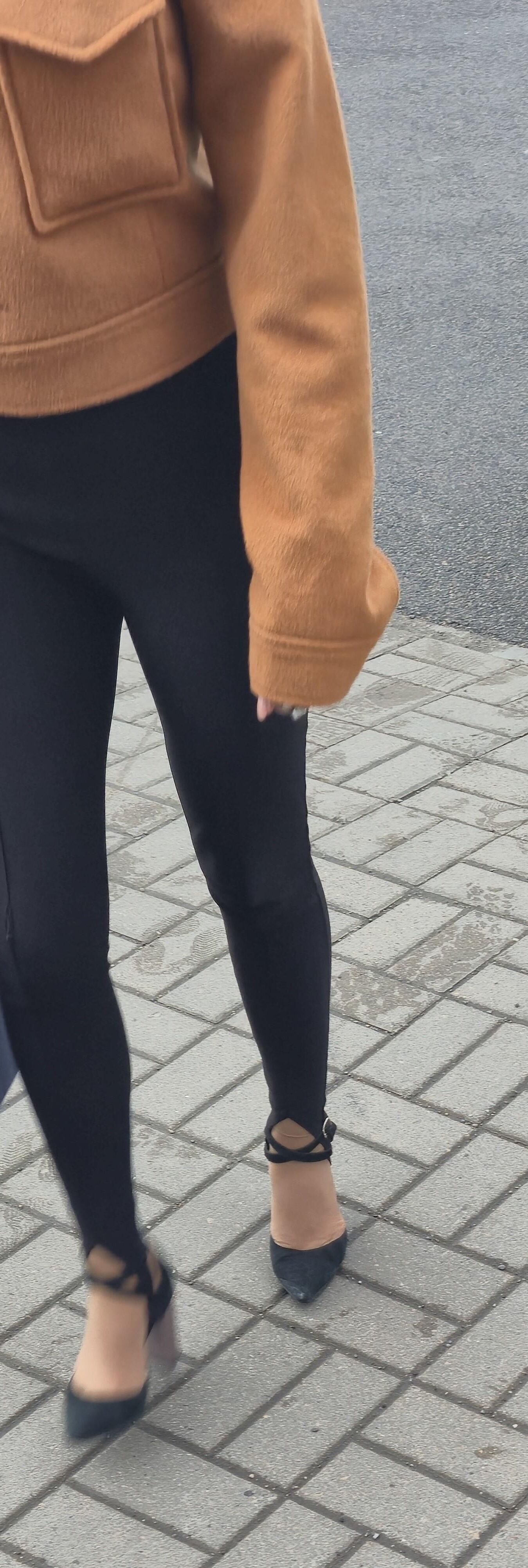 Woman in leggins and suede heels