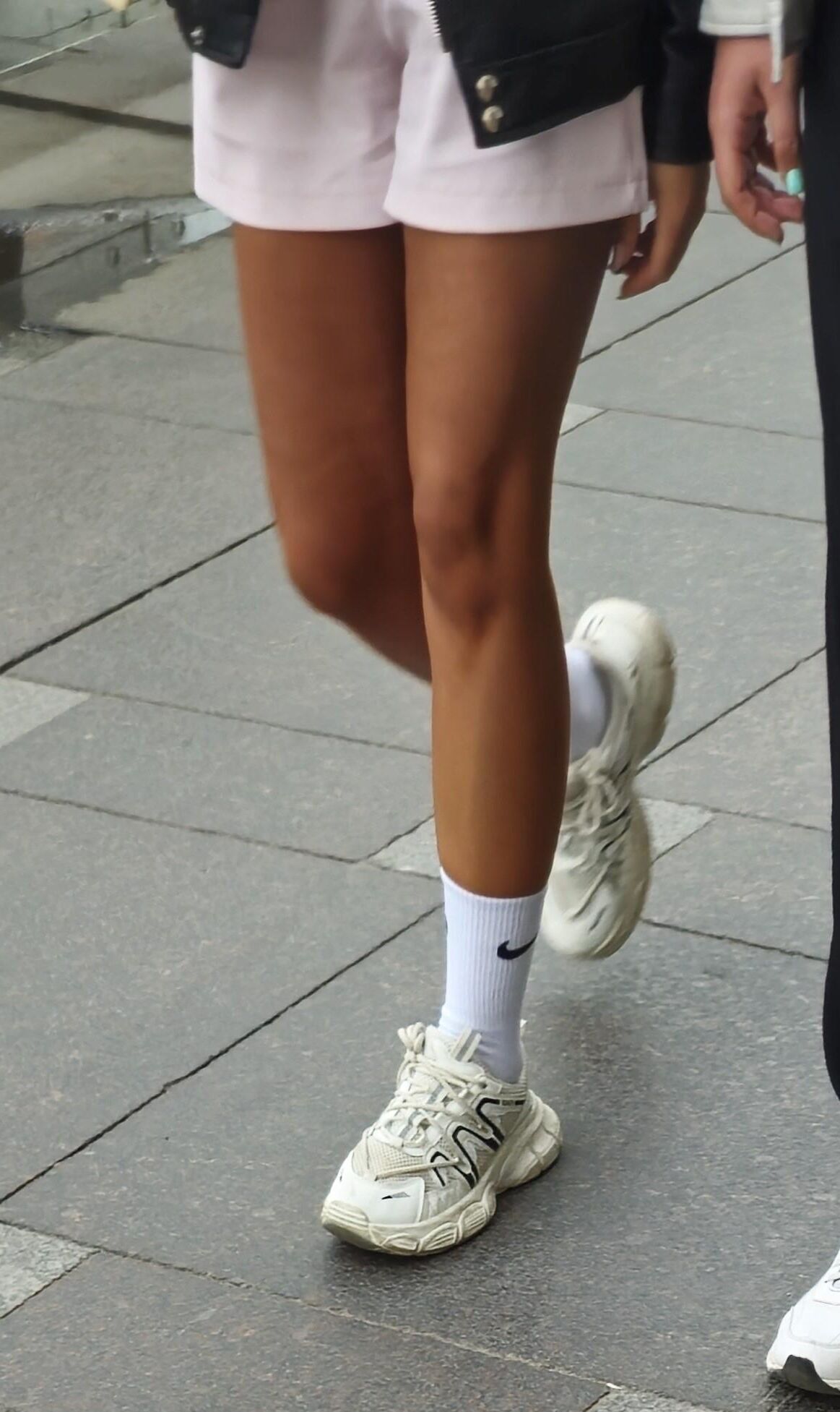 Beautiful girl in pink shorts